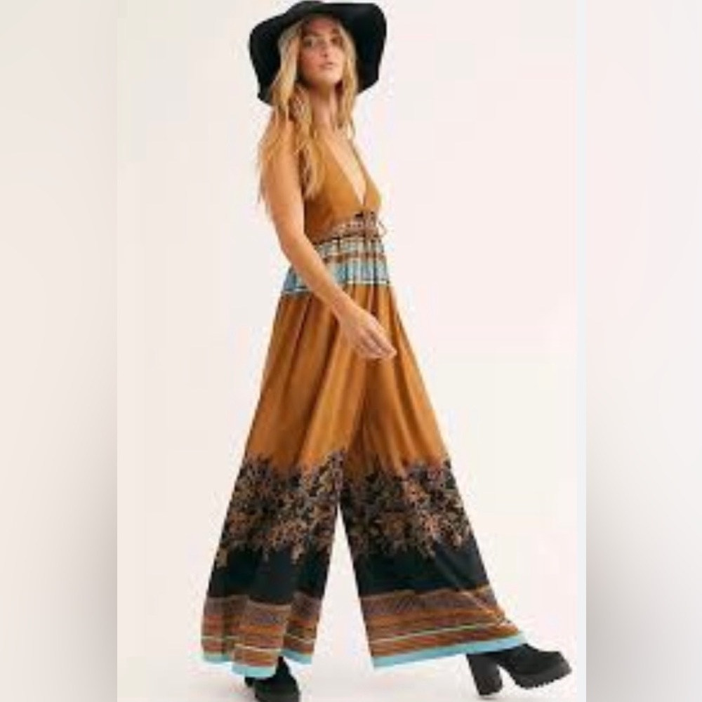 Free People Palm Beach Wide Leg Romper 100% viscose.Size M
